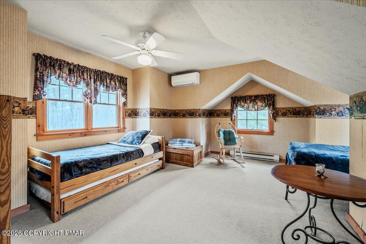 723 Lower Deer Valley Road Tannersville, PA 18372 - Photo 32 of 58 a bedroom with furniture and a window