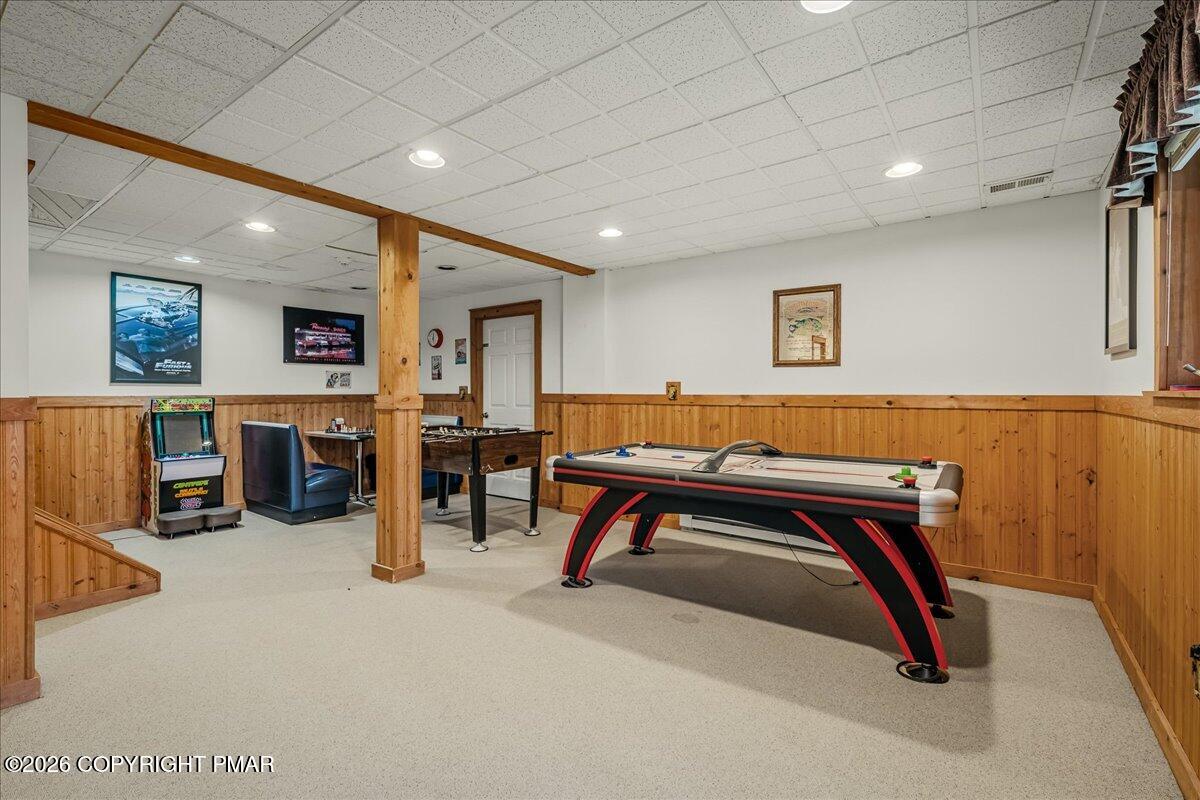 723 Lower Deer Valley Road Tannersville, PA 18372 - Photo 37 of 58 a room with furniture and air hockey table
