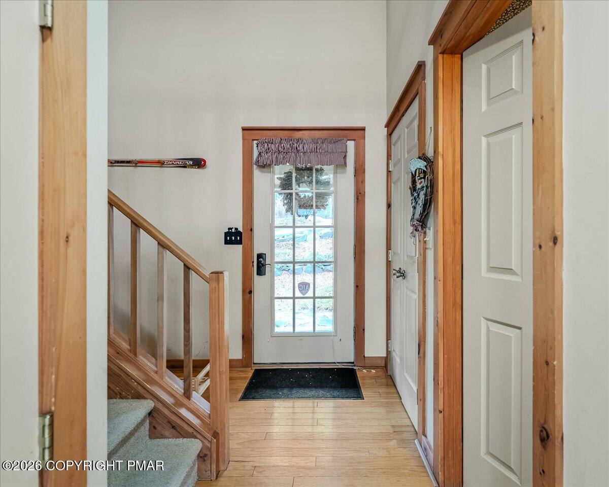 723 Lower Deer Valley Road Tannersville, PA 18372 - Photo 4 of 58 a view of a entryway door with wooden floor