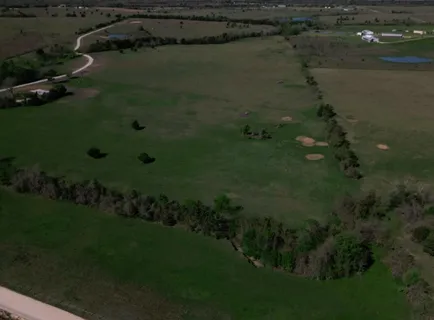 a view of a lake from a yard