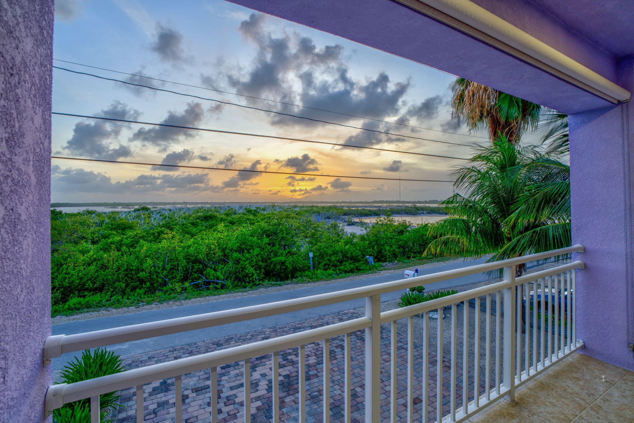 823 Indies Road Summerland Key, FL 33042 - Photo 11 of 48 a view of a porch with a yard