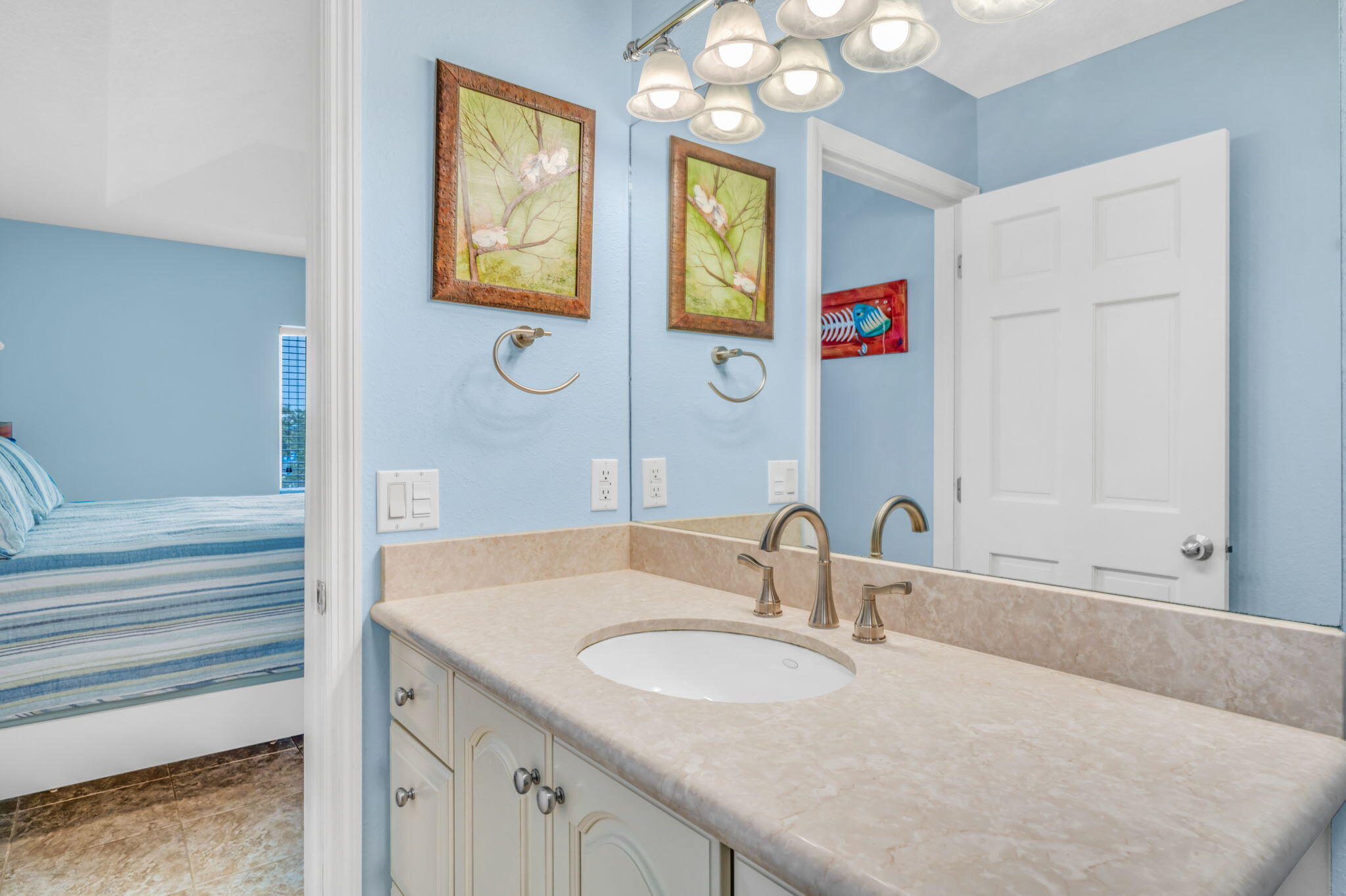 823 Indies Road Summerland Key, FL 33042 - Photo 21 of 48 a bathroom with a granite countertop sink and a mirror