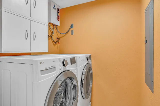 a utility room with dryer and washer