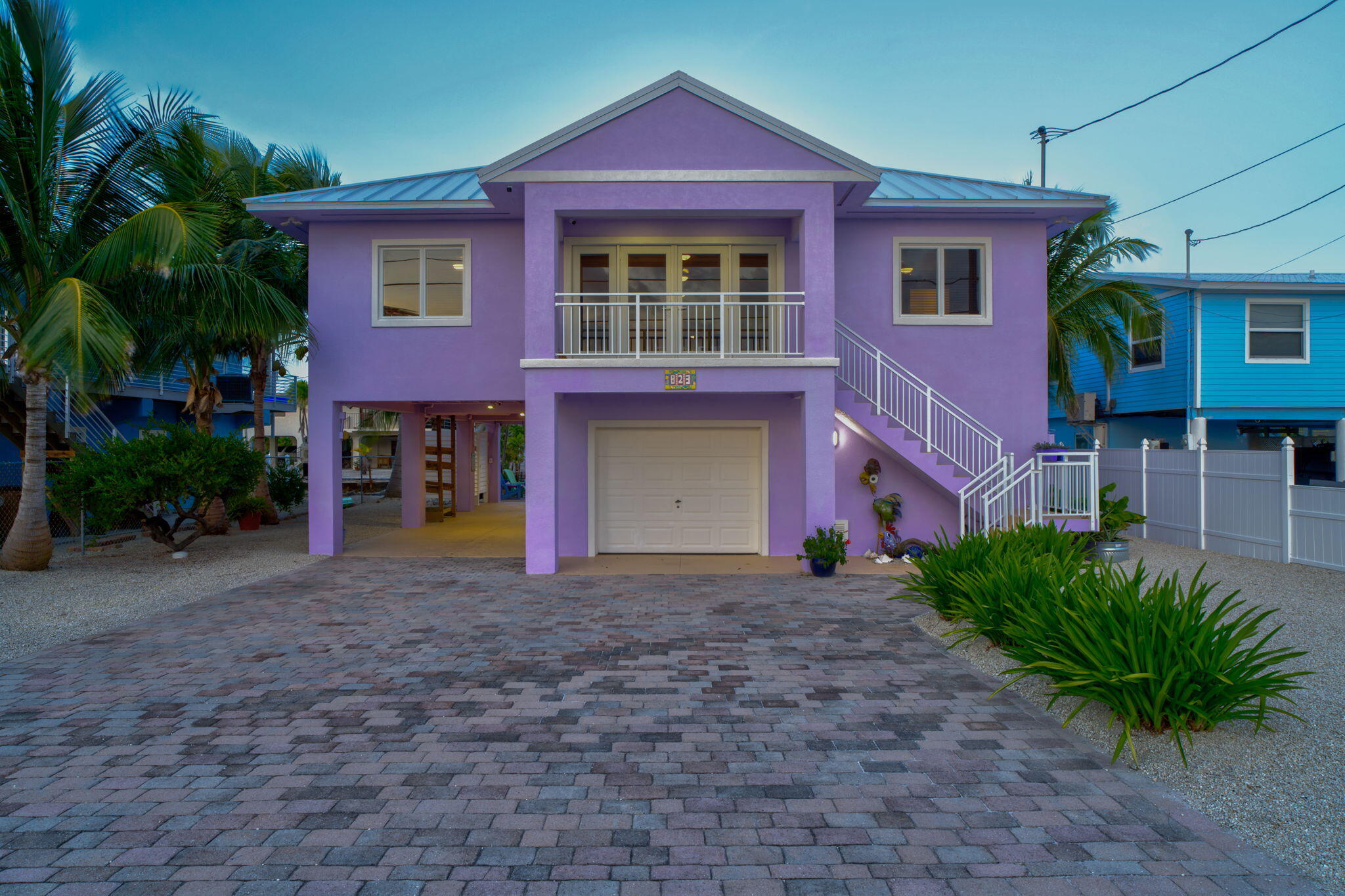 823 Indies Road Summerland Key, FL 33042 - Photo 38 of 48 a front view of a house with yard and tree