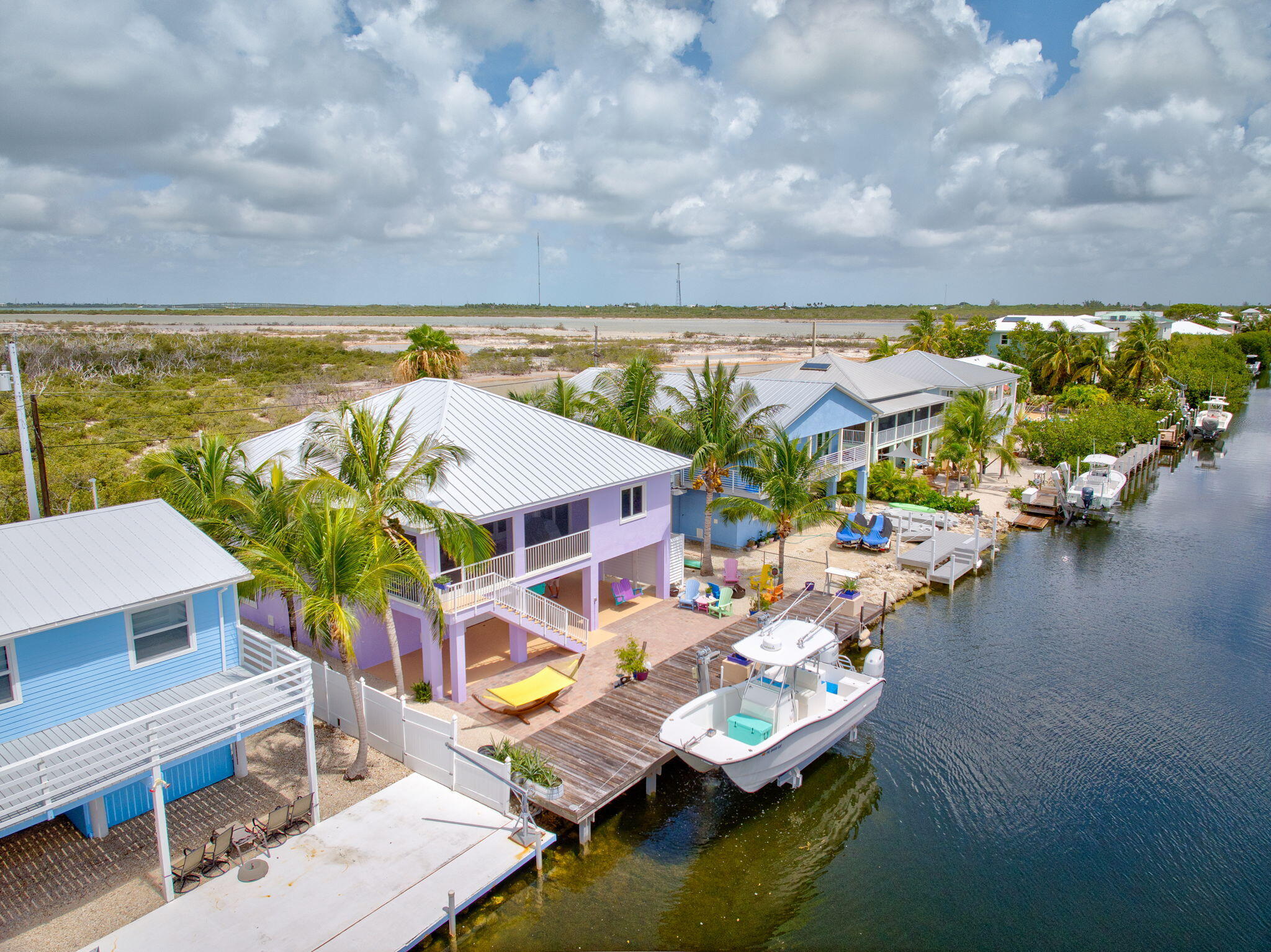 823 Indies Road Summerland Key, FL 33042 - Photo 45 of 48 an aerial view of house with yard swimming pool and outdoor seating