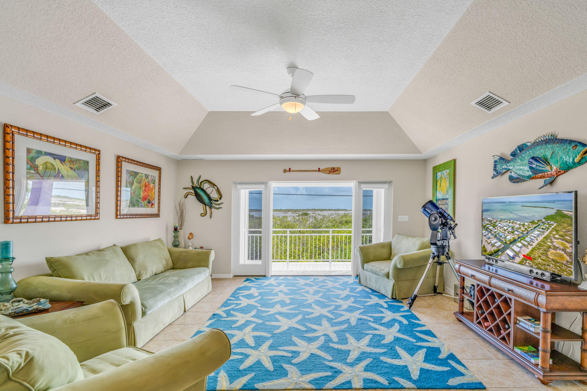 823 Indies Road Summerland Key, FL 33042 - Photo 8 of 48 a living room with furniture and a window