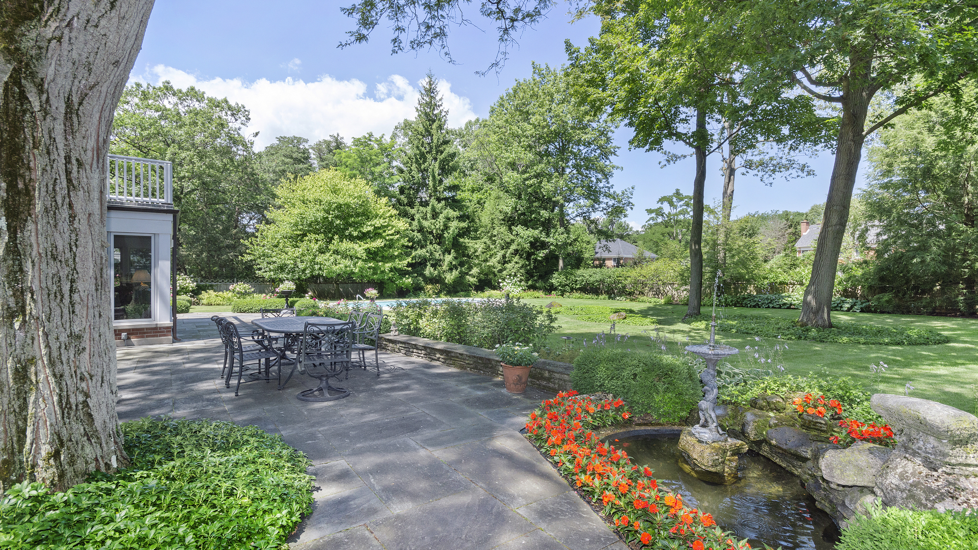 109 Woodley Road Winnetka, IL 60093 - Photo 11 of 24 a view of a table and chairs in the garden