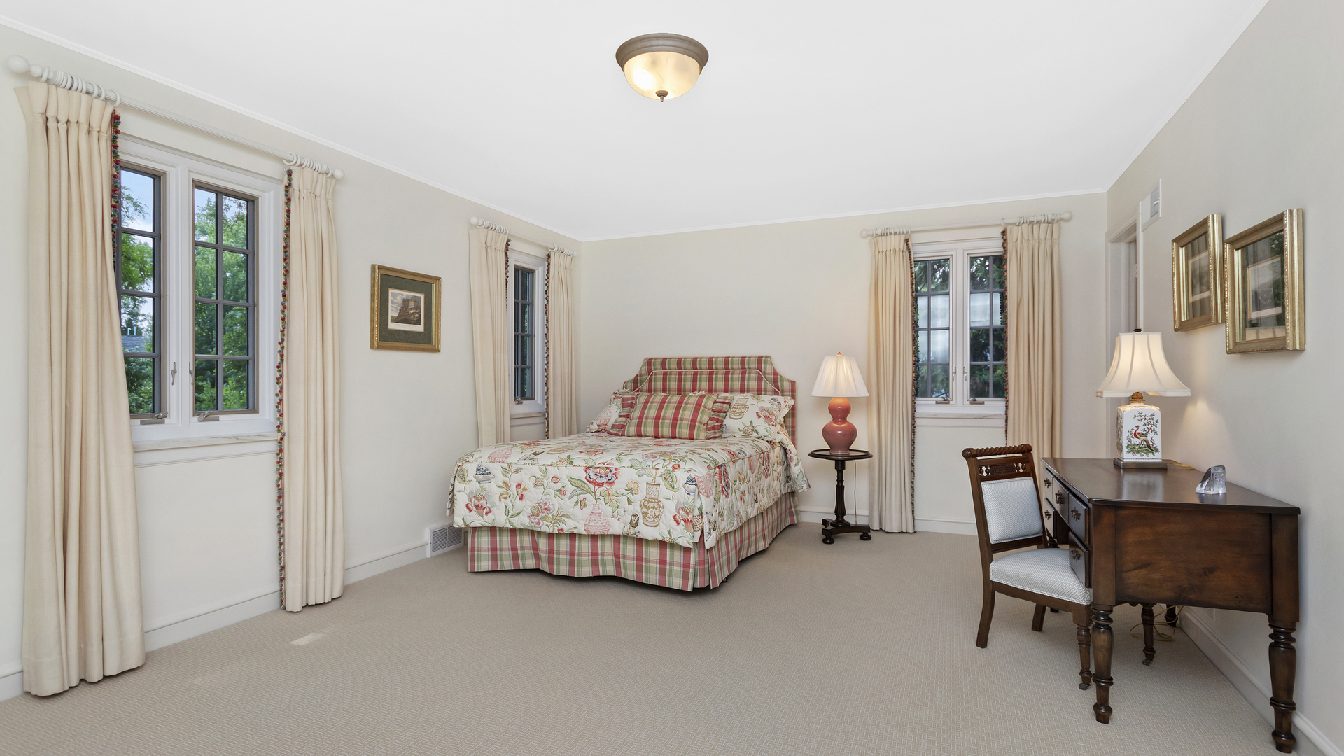 109 Woodley Road Winnetka, IL 60093 - Photo 16 of 24 a bedroom with a bed chair and a window