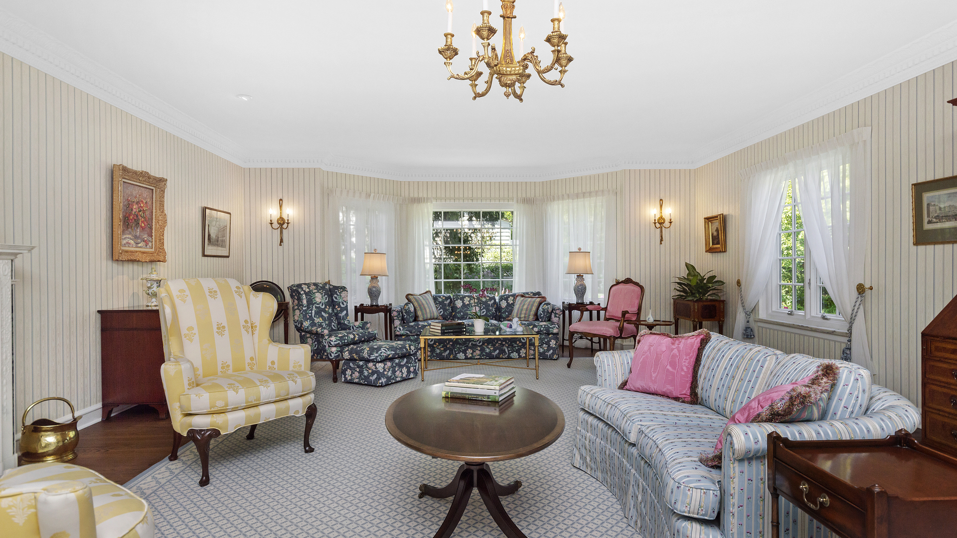 109 Woodley Road Winnetka, IL 60093 - Photo 4 of 24 a living room with furniture and a wooden floor