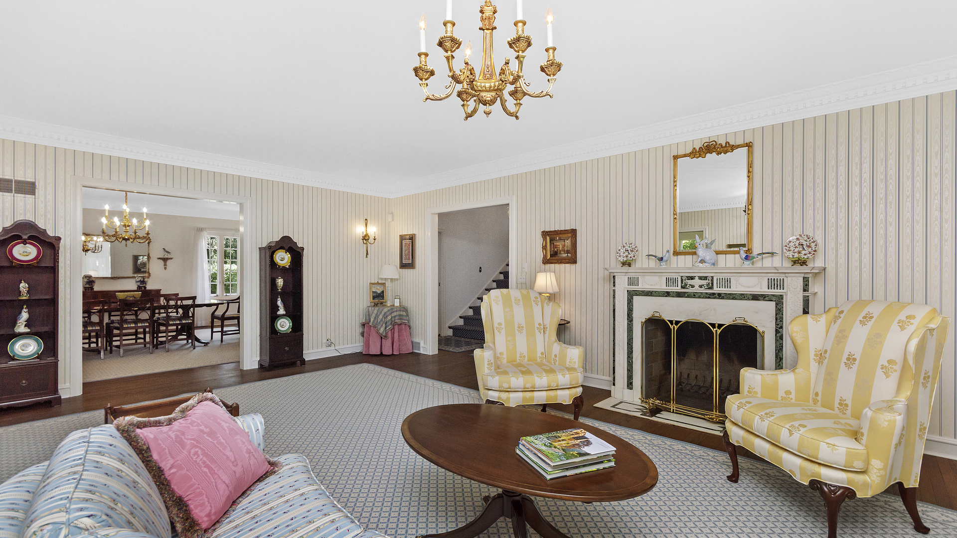 109 Woodley Road Winnetka, IL 60093 - Photo 5 of 24 a living room with furniture and a fireplace