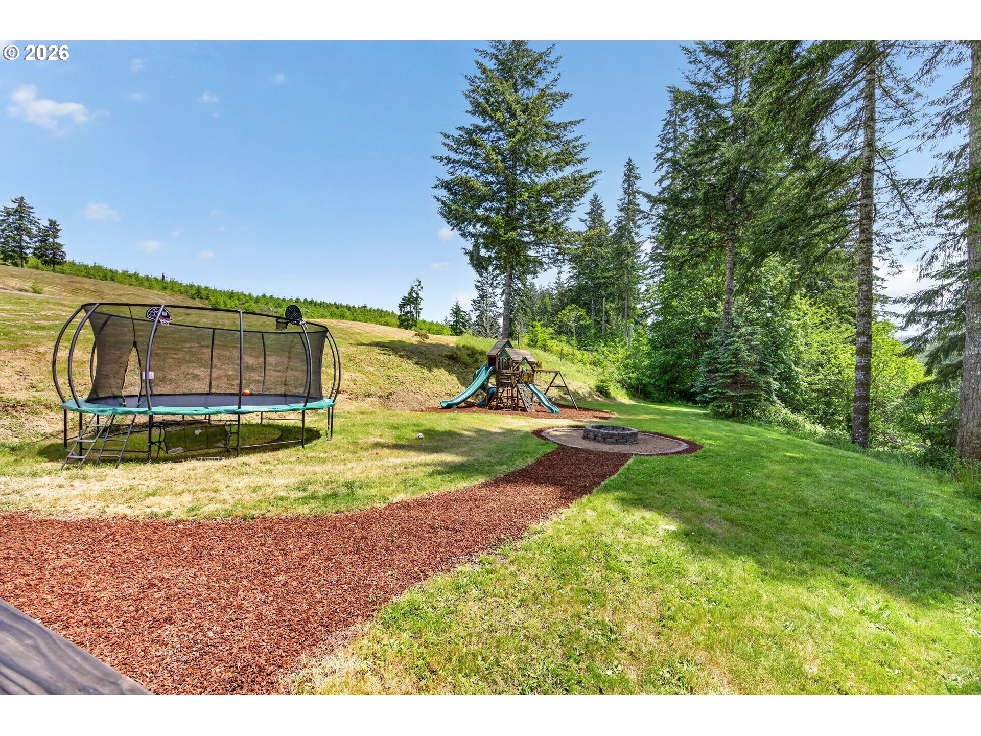 6895 Canary Road Westlake, OR 97493 - Photo 33 of 40 a view of a yard with swimming pool
