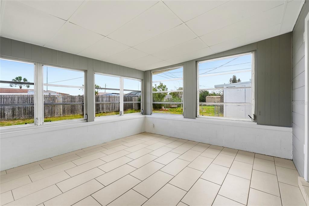 363 Glen Oak Road Venice, FL 34293 - Photo 28 of 53 a view of an empty room with a window