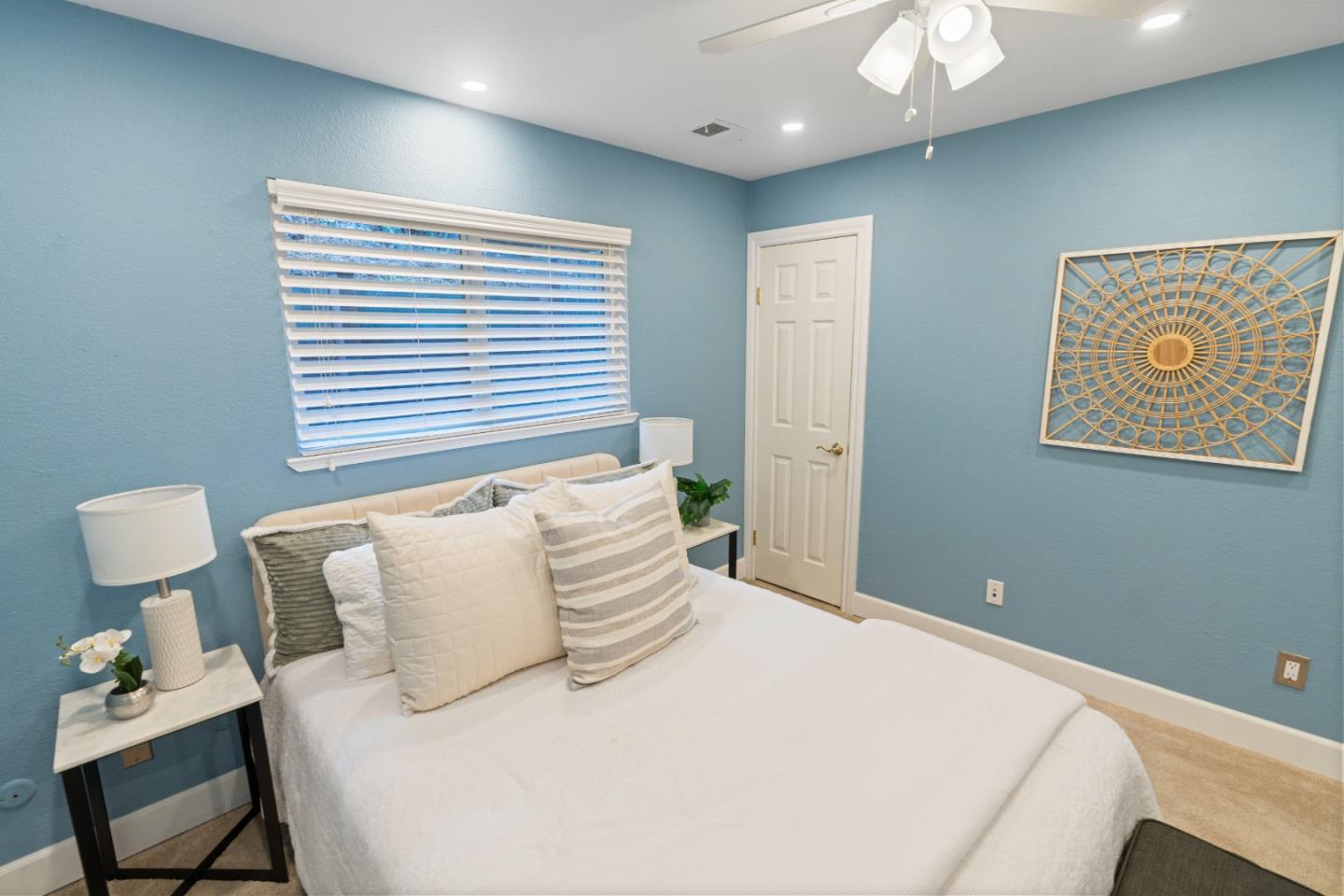 112 Alto Sol Court Scotts Valley, CA 95066 - Photo 16 of 58 a bedroom with a bed and a lamp on dresser
