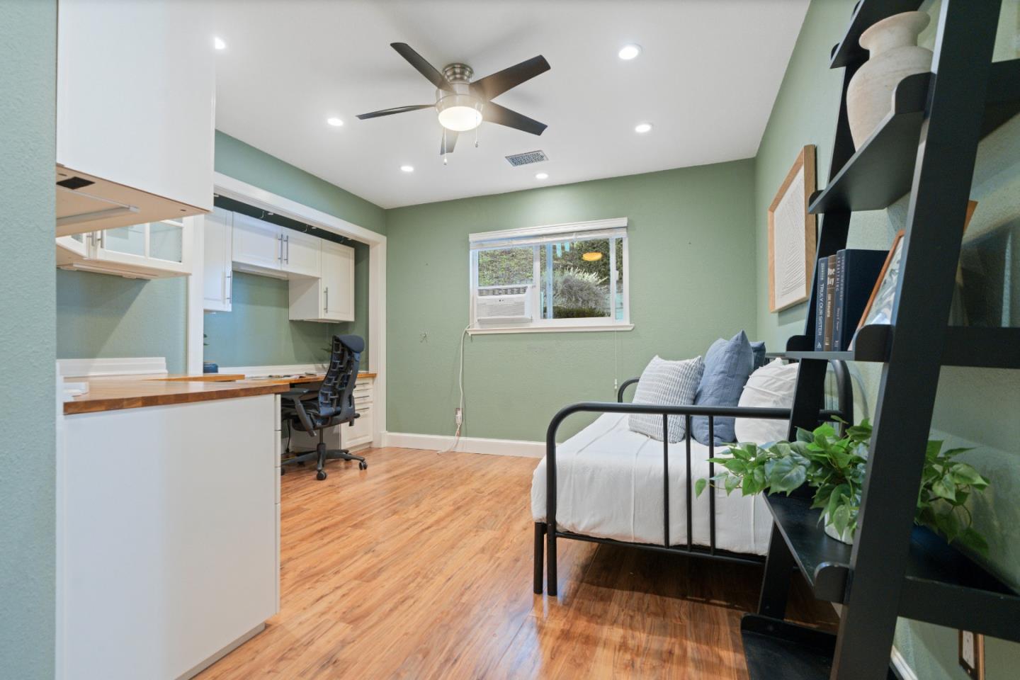 112 Alto Sol Court Scotts Valley, CA 95066 - Photo 23 of 58 a living room with furniture and a painting on the wall