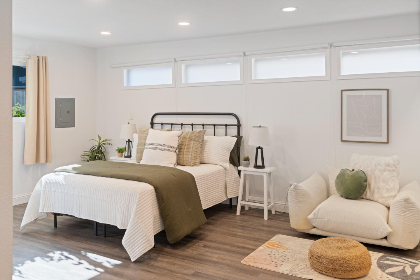 112 Alto Sol Court Scotts Valley, CA 95066 - Photo 31 of 58 a bedroom with a bed and wooden floor