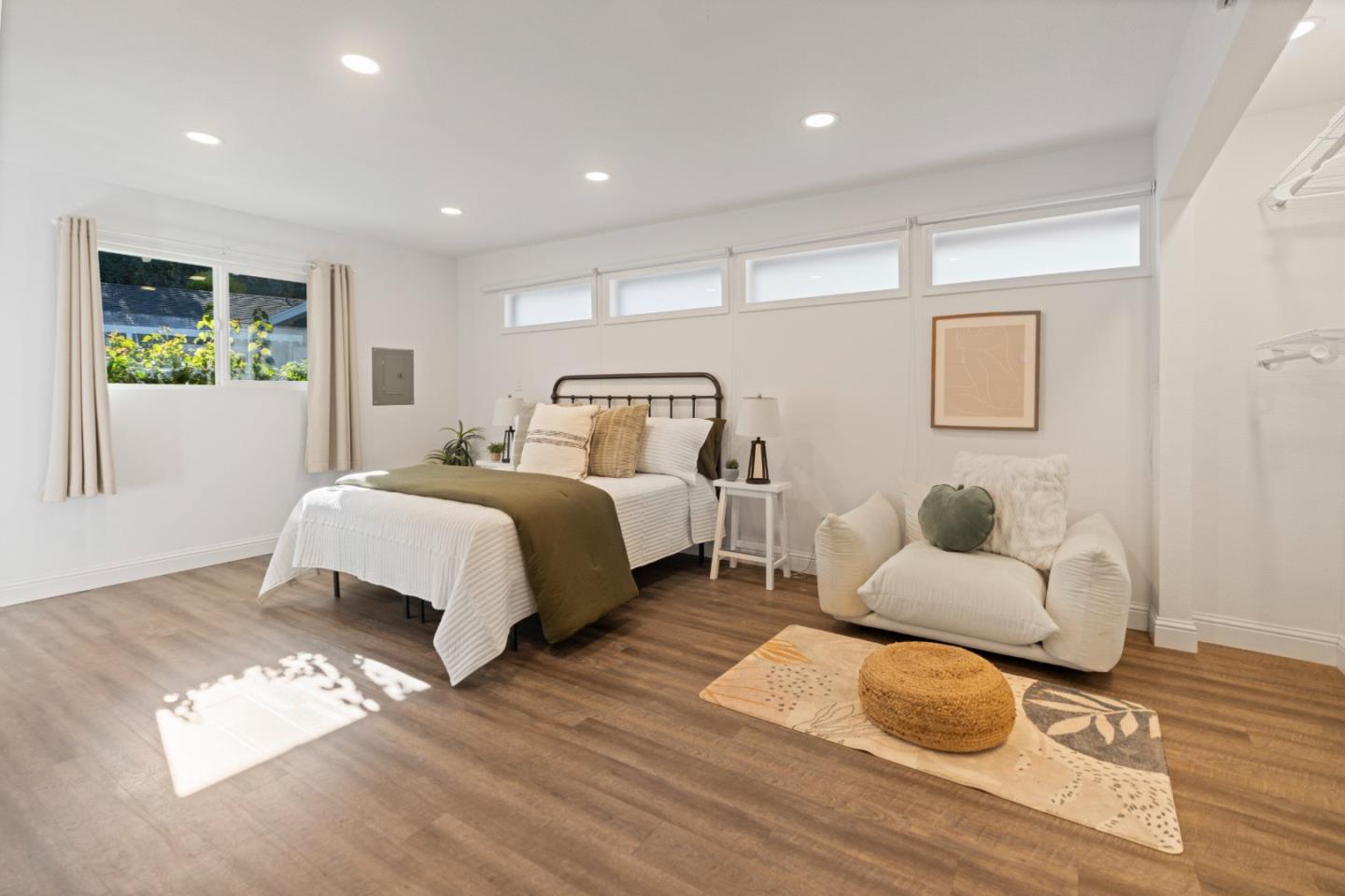 112 Alto Sol Court Scotts Valley, CA 95066 - Photo 32 of 58 a bedroom with a bed and a couch