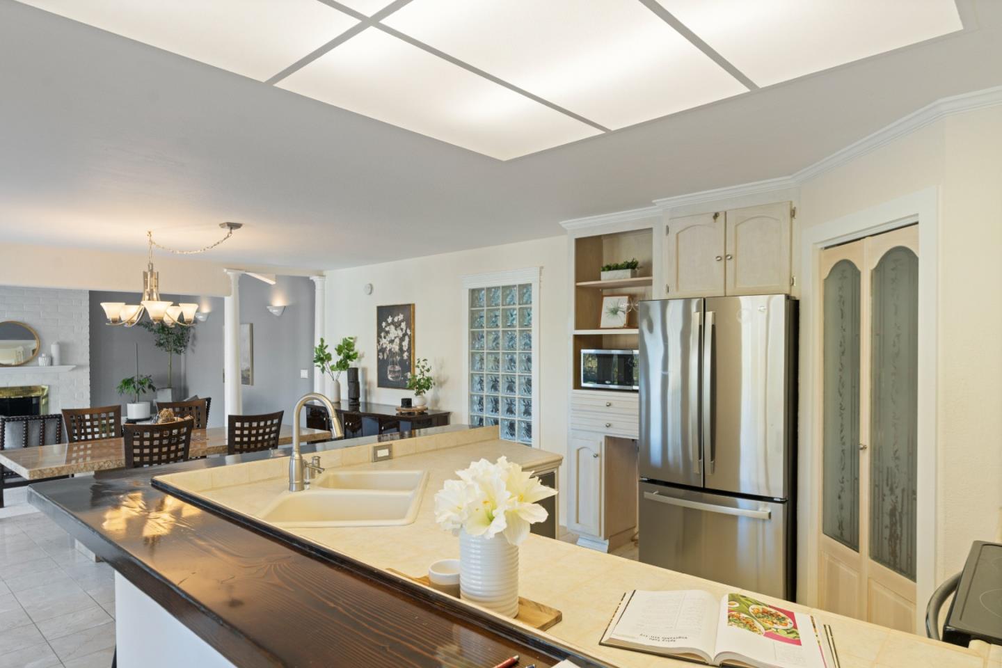 112 Alto Sol Court Scotts Valley, CA 95066 - Photo 9 of 58 a kitchen with stainless steel appliances granite countertop a refrigerator and a sink