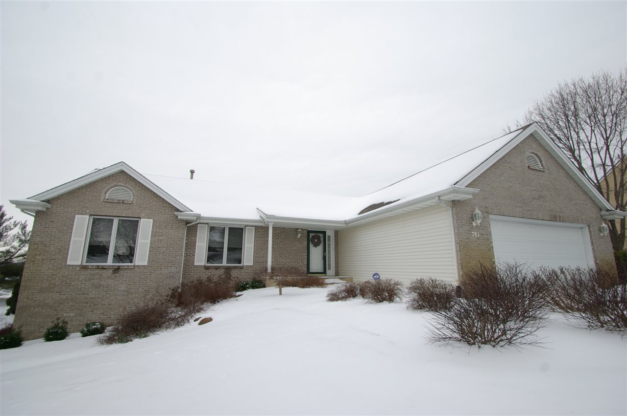 781 Timber Ridge Trail Rockford, IL 61114 - Photo 1 of 24 a front view of a house with a yard