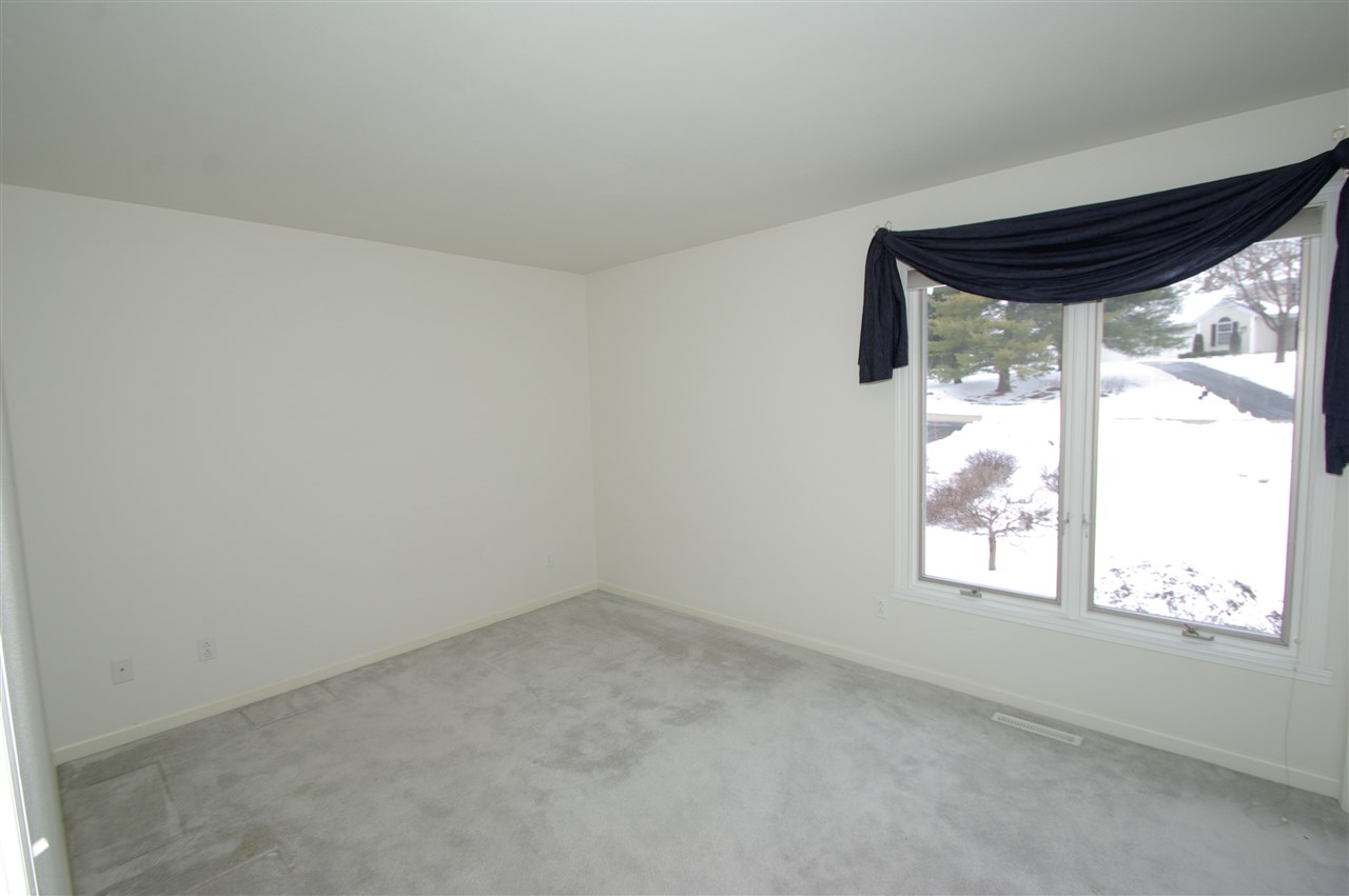 781 Timber Ridge Trail Rockford, IL 61114 - Photo 12 of 24 an empty room with a window