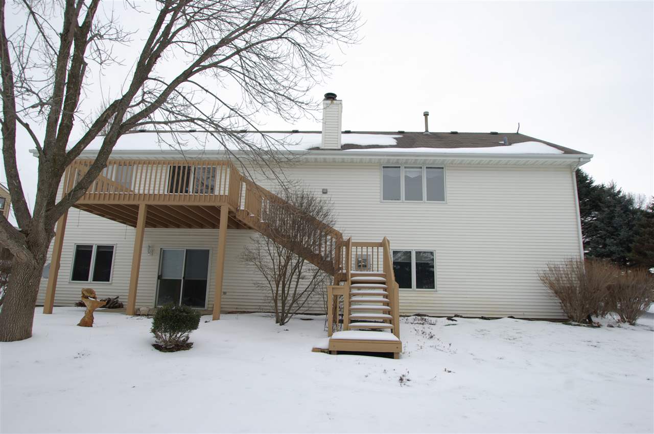 781 Timber Ridge Trail Rockford, IL 61114 - Photo 22 of 24 a view of a house with a yard