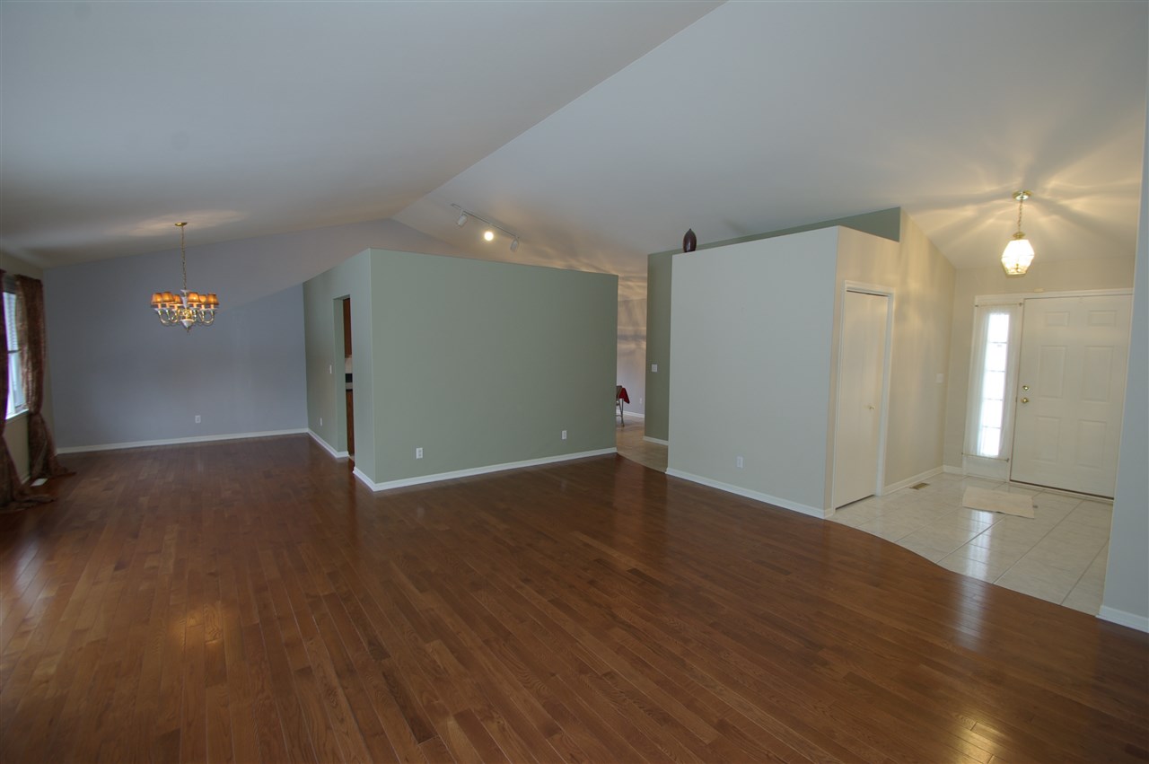 781 Timber Ridge Trail Rockford, IL 61114 - Photo 4 of 24 a view of a livingroom with wooden floor