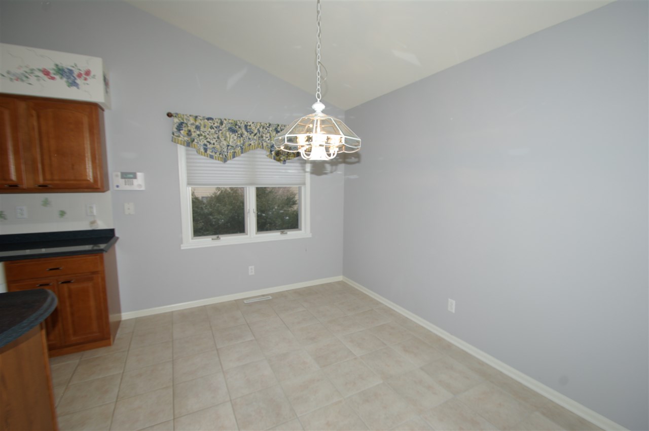 781 Timber Ridge Trail Rockford, IL 61114 - Photo 8 of 24 a window in an empty room