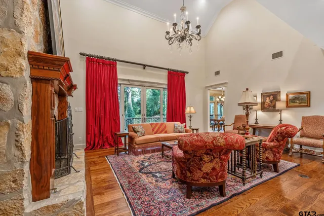 a living room with furniture windows and a fireplace
