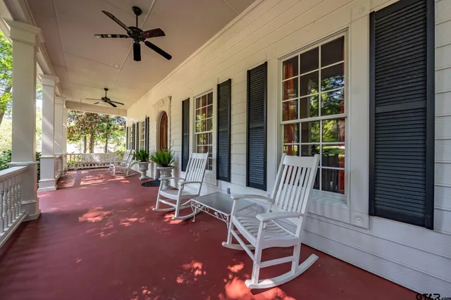 a view of a livingroom with furniture and a yard