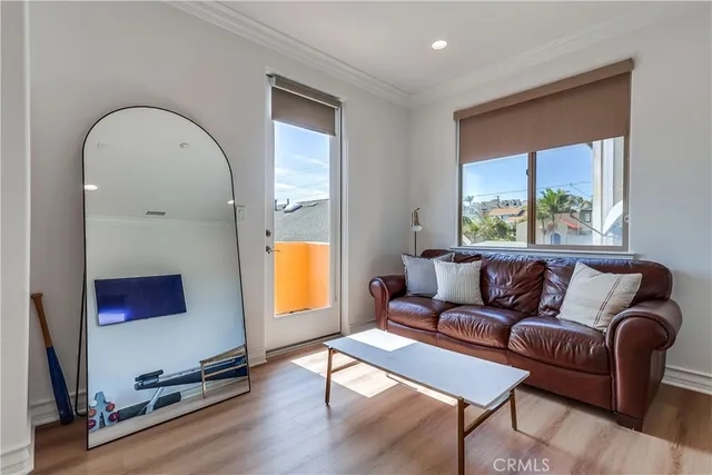 a bathroom with a granite countertop sink a large mirror and a shower