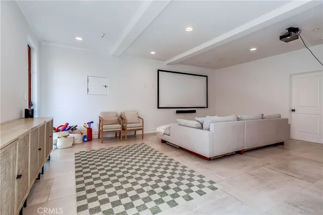 a living room with furniture and a lamp