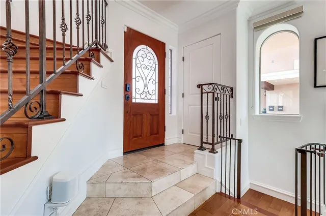 a view of front door with stairs