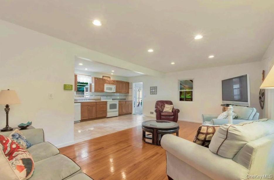 430 Grove Road Southold, NY 11971 - Photo 7 of 15 a living room with furniture and view of kitchen