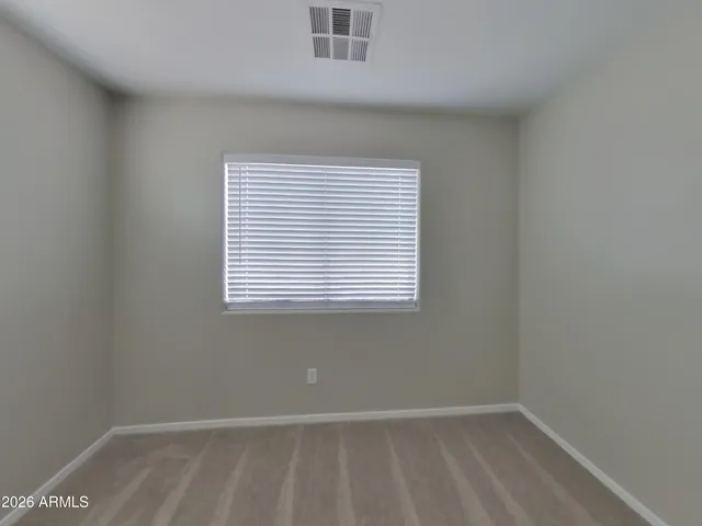an empty room with closet