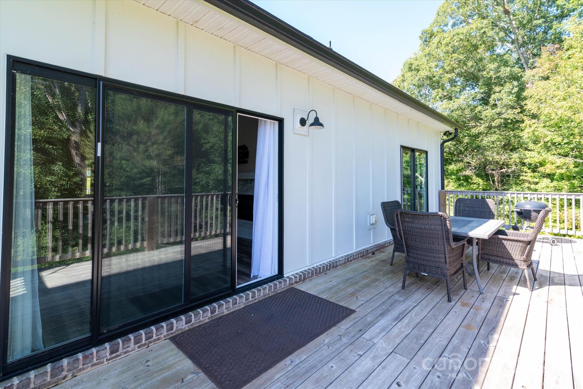 5345 Christopher Road Iron Station, NC 28080 - Photo 11 of 48 a view of a two chairs in the balcony