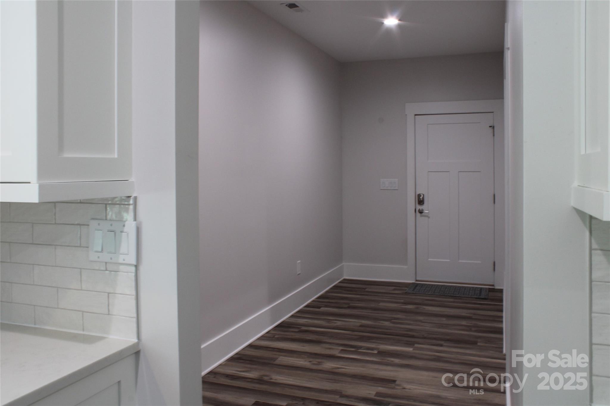 5345 Christopher Road Iron Station, NC 28080 - Photo 18 of 48 a view of wooden door