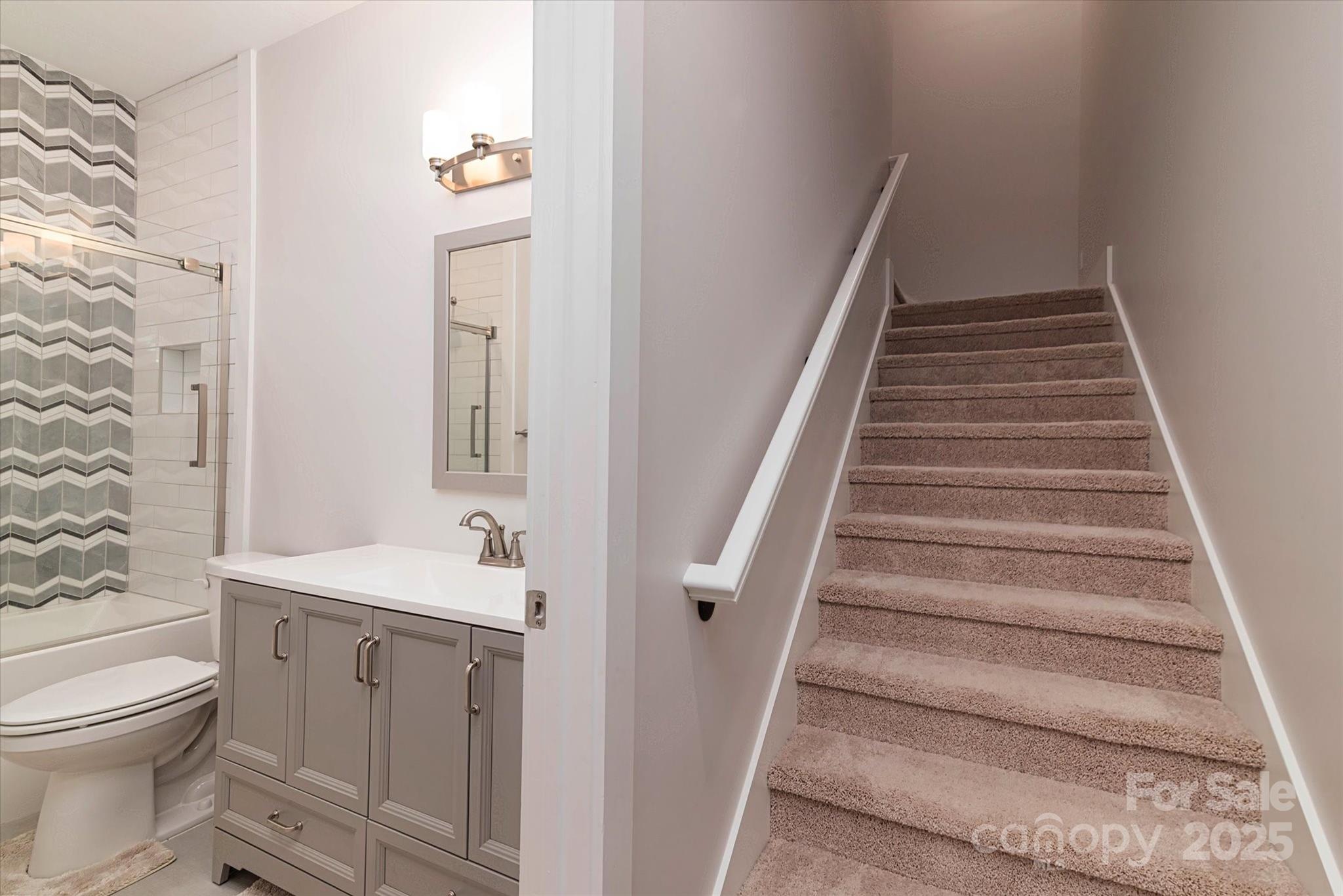 5345 Christopher Road Iron Station, NC 28080 - Photo 36 of 48 a bathroom with a sink and a toilet
