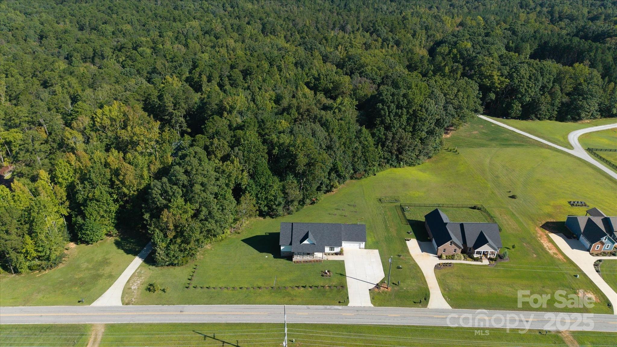 5345 Christopher Road Iron Station, NC 28080 - Photo 47 of 48 an aerial view of a house with a yard