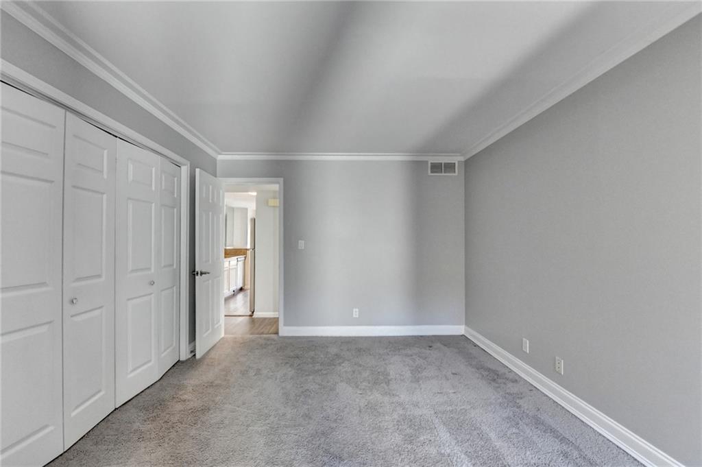 911 Garden Court, Unit 911 Atlanta, GA 30328 - Photo 23 of 41 a view of an empty room