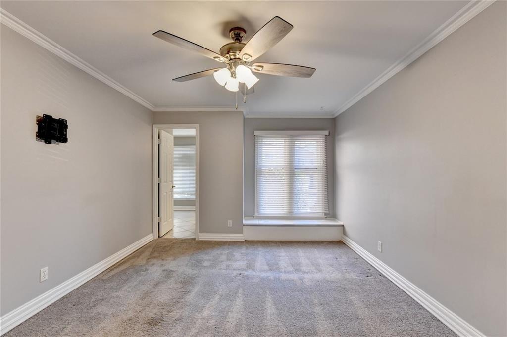 911 Garden Court, Unit 911 Atlanta, GA 30328 - Photo 27 of 41 a view of an empty room with a window