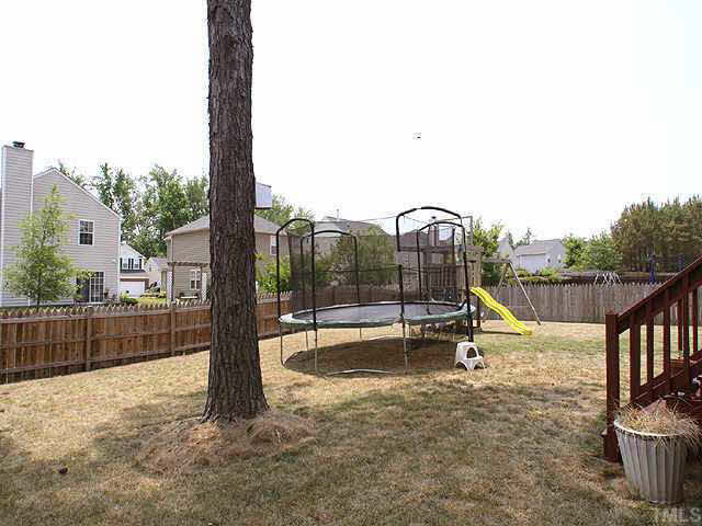 333 Seastone Street Raleigh, NC 27603 - Photo 9 of 9 Fenced backyard, tons of area for a garden, play equipment, deck, great neighborhood for entertainment and activity. Other