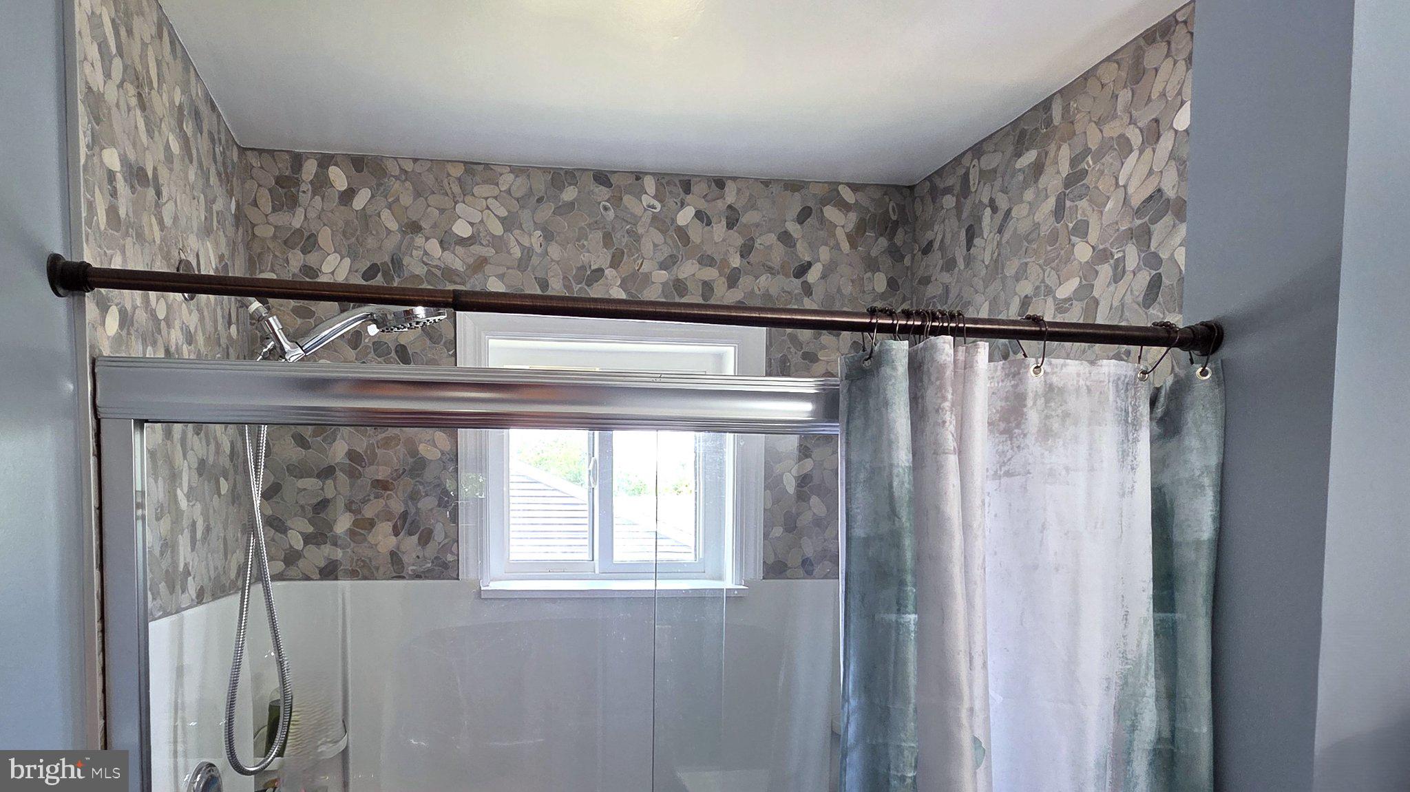 263 Madison Road Mantua, NJ 08051 - Photo 5 of 11 Modern shower with stylish accents.
