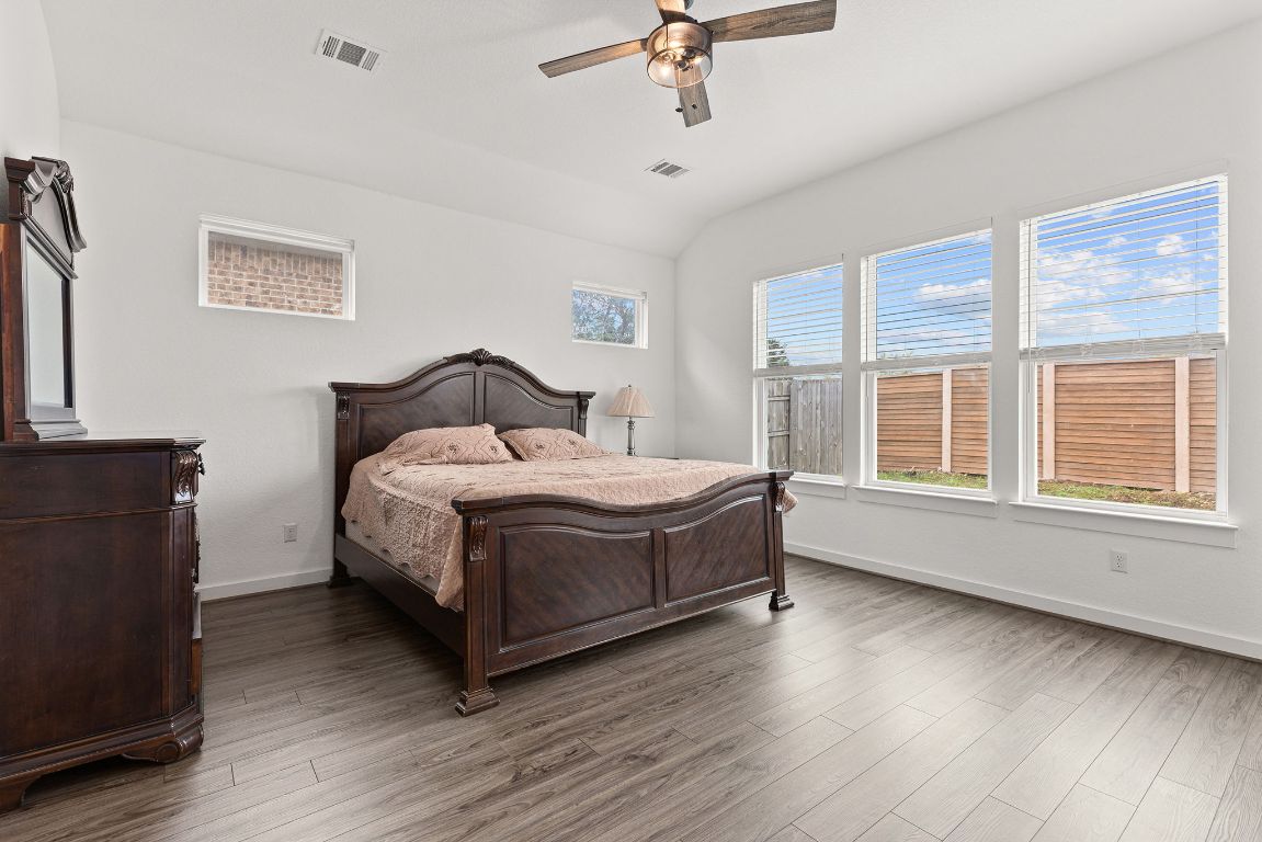 317 Independence Drive Kyle, TX 78640 - Photo 20 of 40 The first thing you notice is the light—it just pours in from the windows, bouncing off the soft, neutral tones and making the whole space feel calm and open.