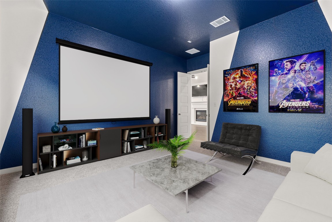 317 Independence Drive Kyle, TX 78640 - Photo 35 of 40 The unique geometric wall accents add a modern touch that stands out without being overpowering. Imagine movie nights here, cozy and immersive, or watching the big game with friends—the acoustics are bound to be incredible.
*virtually staged*