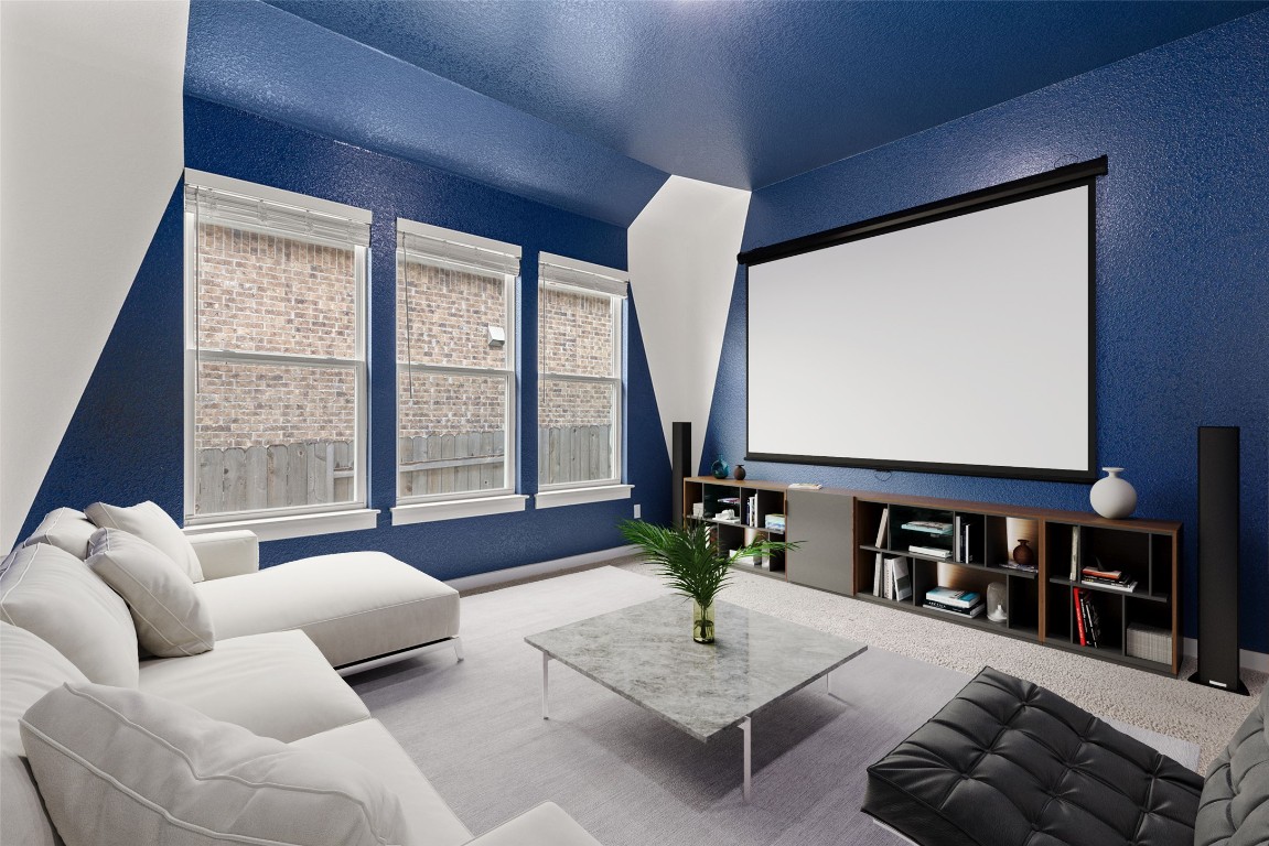 317 Independence Drive Kyle, TX 78640 - Photo 36 of 40 The plush carpet underfoot softens the room, making it feel even more inviting. This isn’t just a place to watch TV; it’s where you unwind and escape.
*virtually staged*