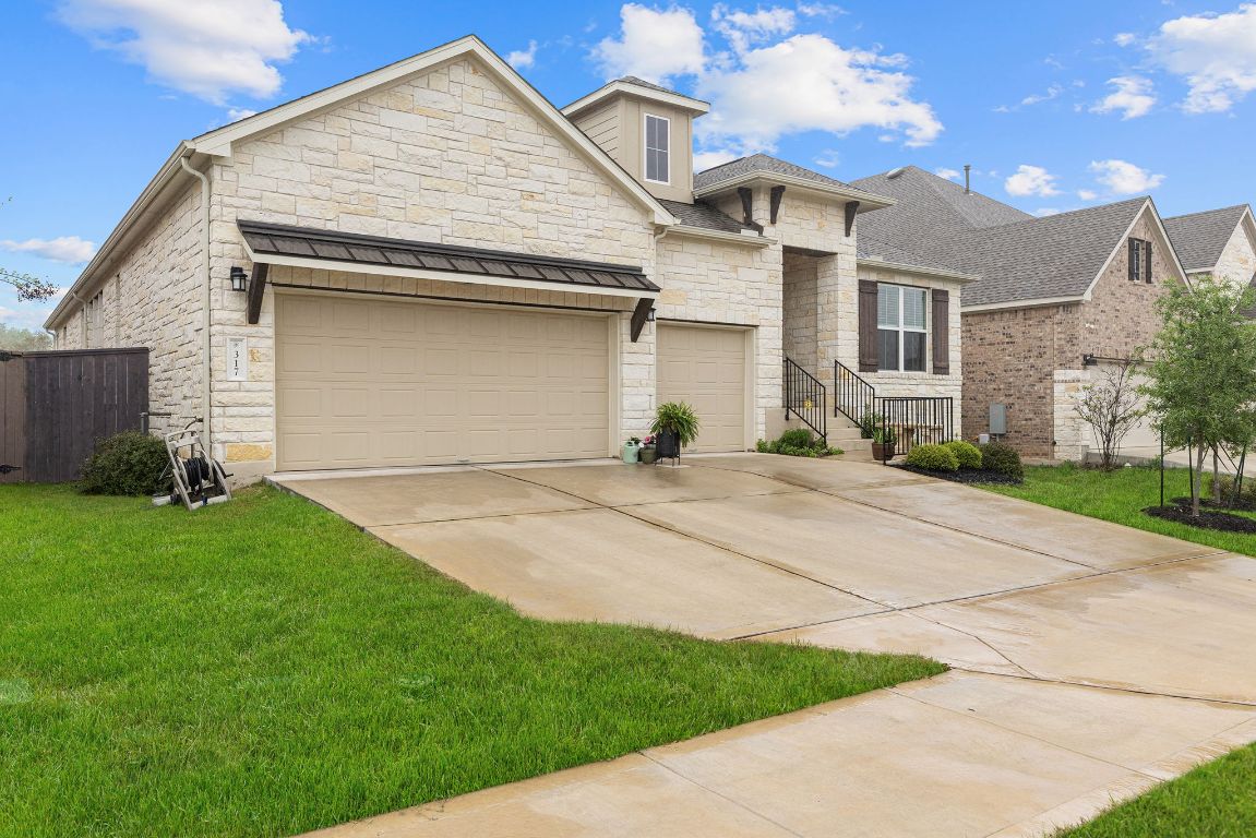 317 Independence Drive Kyle, TX 78640 - Photo 5 of 40 Anthem isn’t just a community—it’s a lifestyle, blending relaxation with a touch of excitement, giving you a place that truly feels like home.