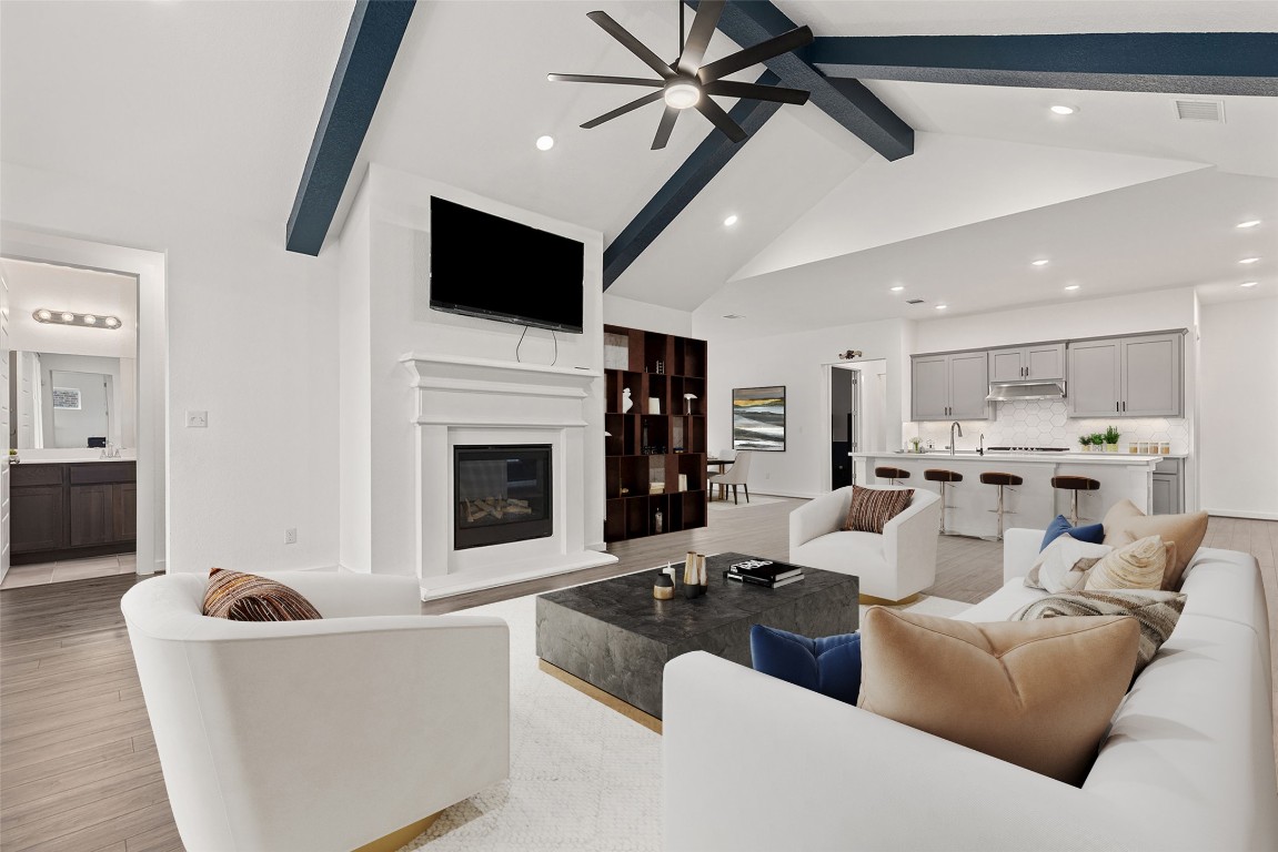 317 Independence Drive Kyle, TX 78640 - Photo 7 of 40 The neutral tones and clean design make it feel calm and balanced, while the statement ceiling fan adds a touch of contemporary flair.
*virtually staged*