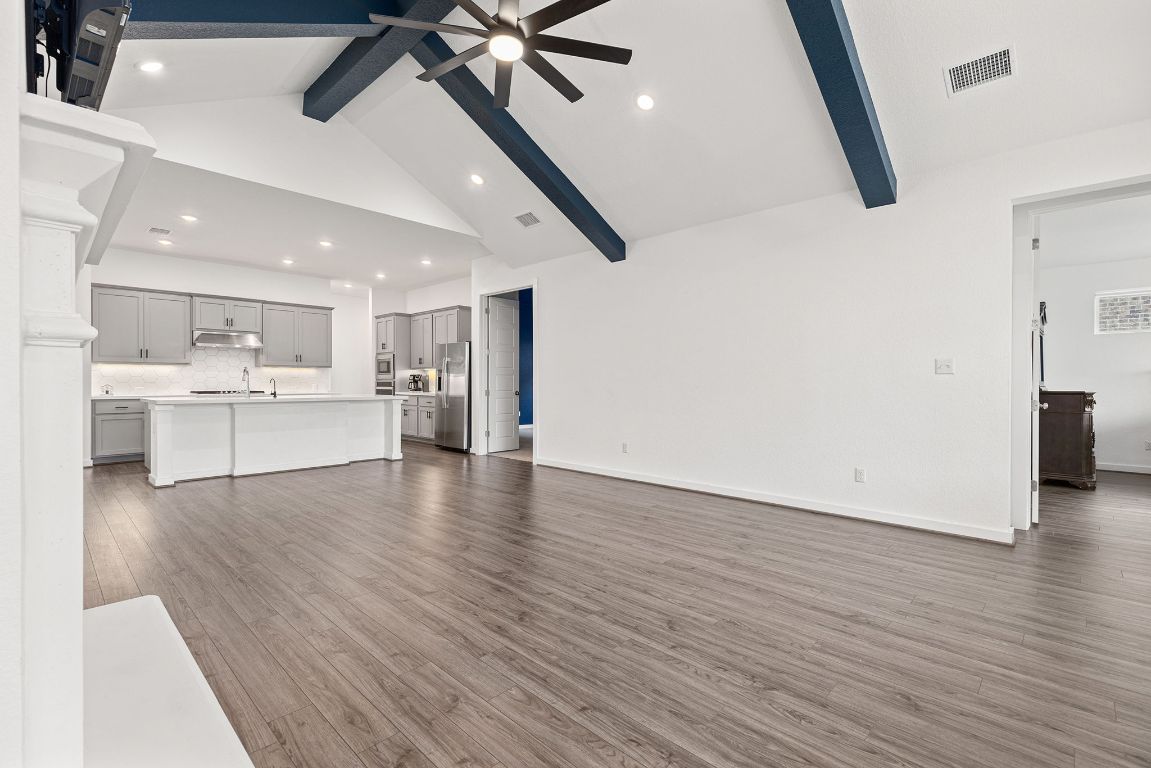 317 Independence Drive Kyle, TX 78640 - Photo 10 of 40 What really makes this family room special is how seamlessly it connects to the kitchen.