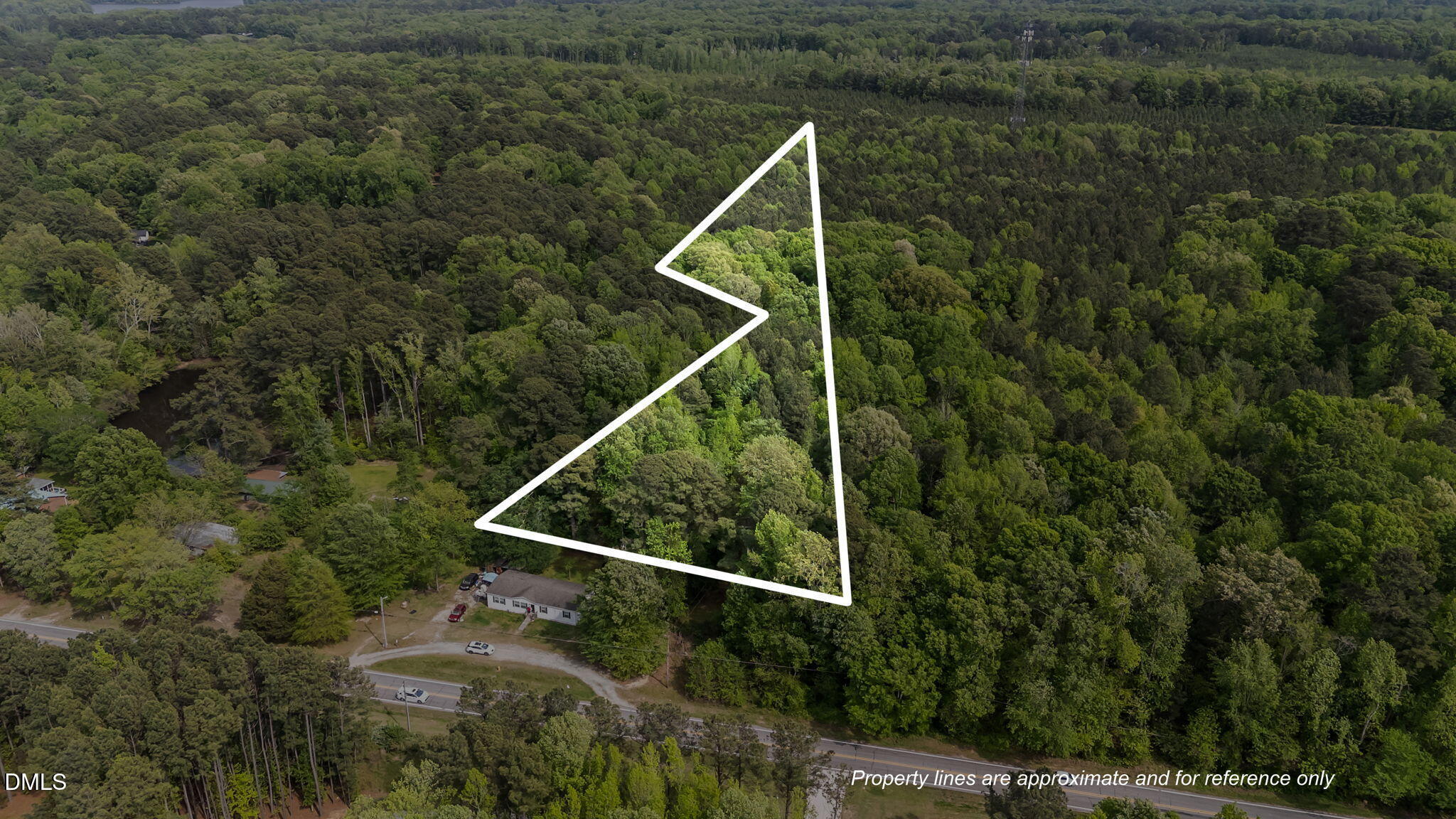 a aerial view of a house with a yard