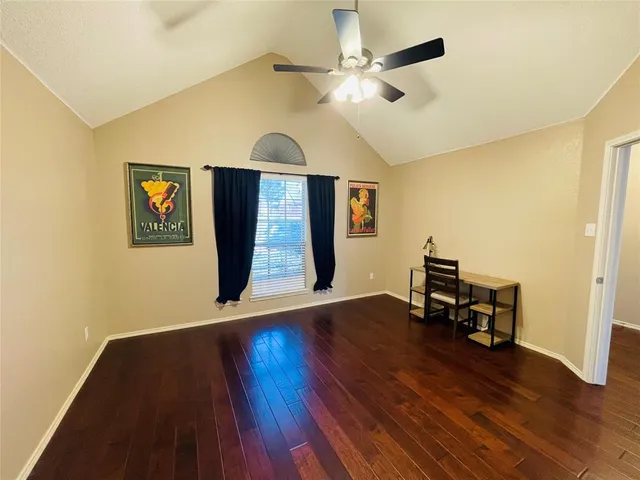 a view of a livingroom with furniture and wooden floor
