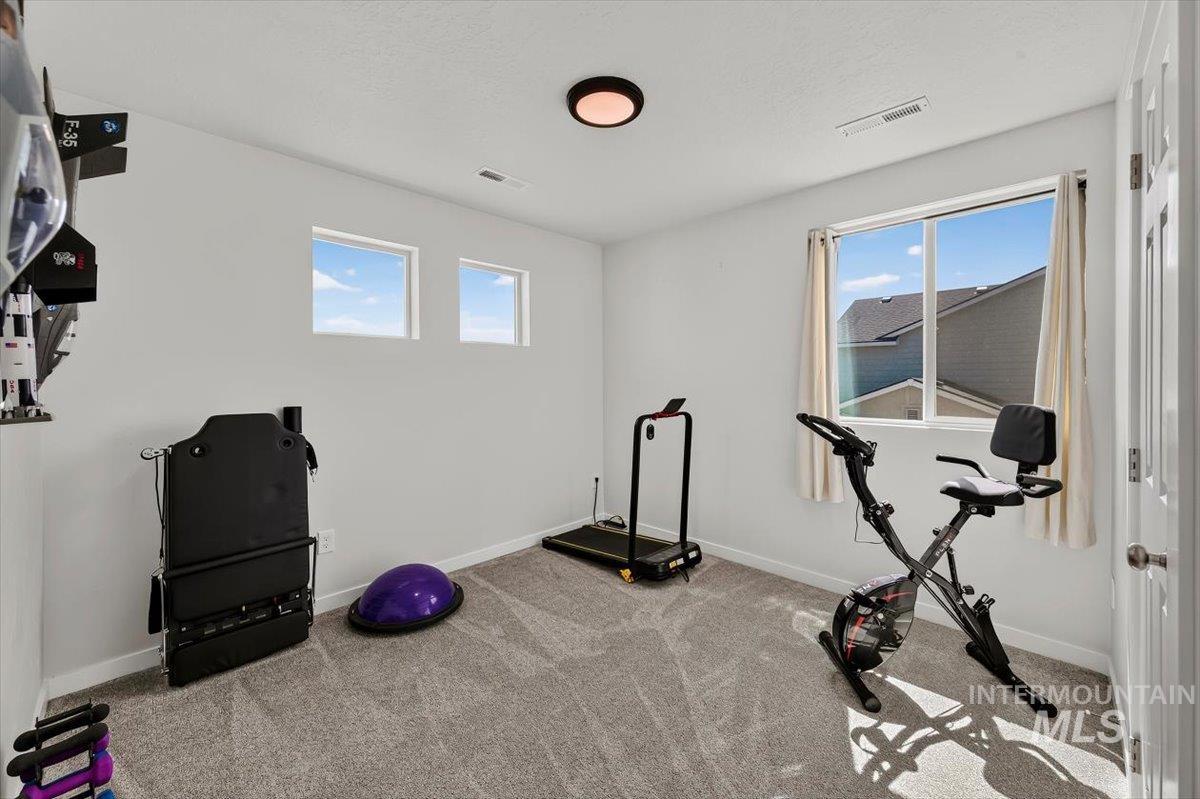 8575 South Foraker Way Kuna, ID 83634 - Photo 30 of 43 Bright fourth bedroom with plenty of windows